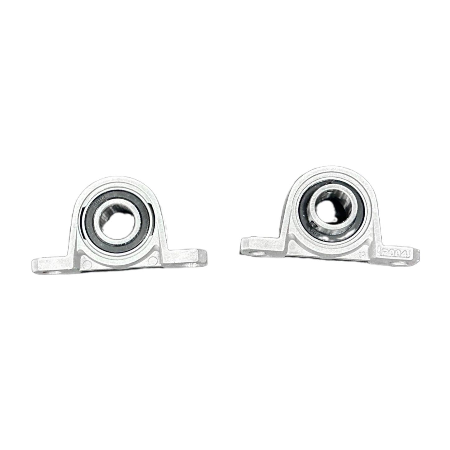 Two metal bearings on a white background