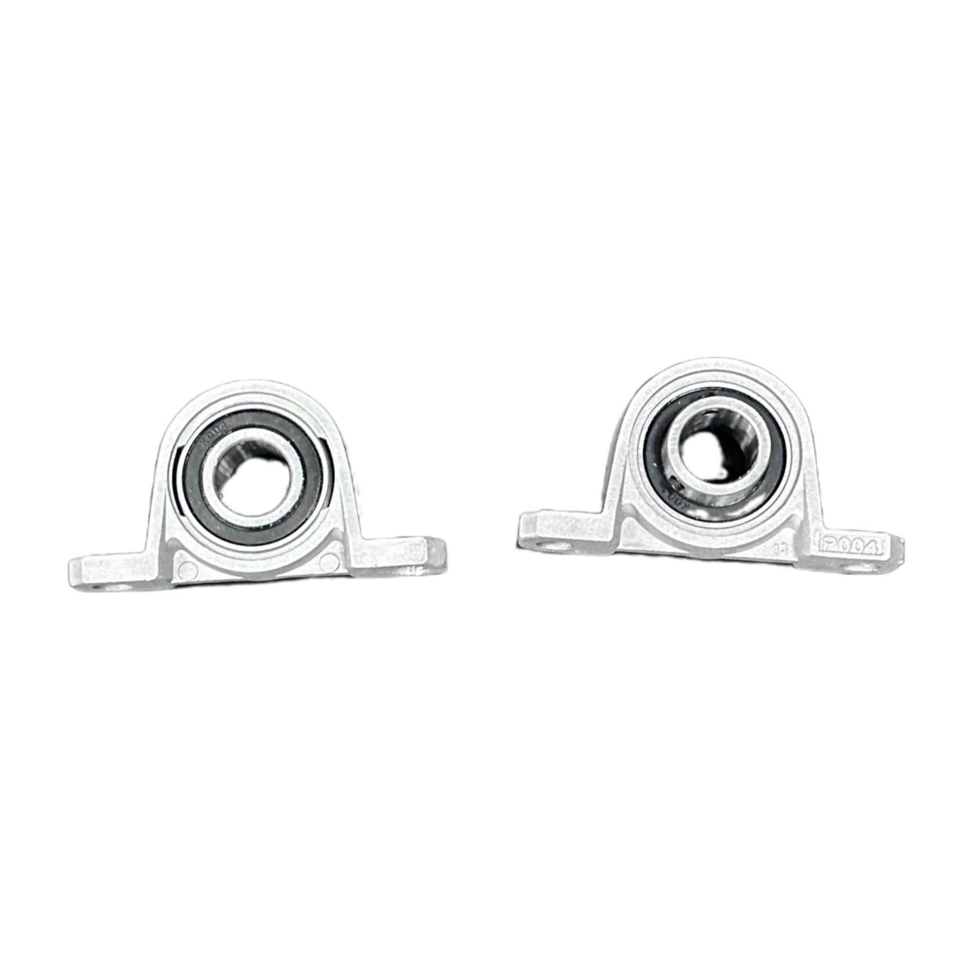 Two metal bearings on a white background